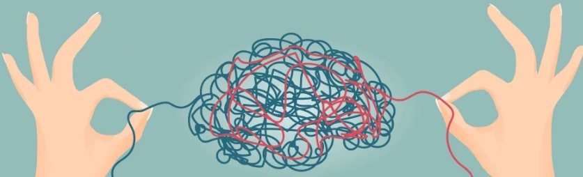 Deux mains démêlent un cerveau de fils, illustrant l’effet de la thérapie cognitive et comportementale pour clarifier les pensées, être dans l’action et modifier ses comportements problématiques.
